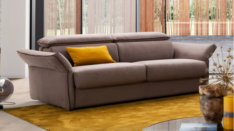 Canapé convertible ODEON - Accoudoirs et têtières réglables pour ce canapé-lit aux deux qualités de couchage.